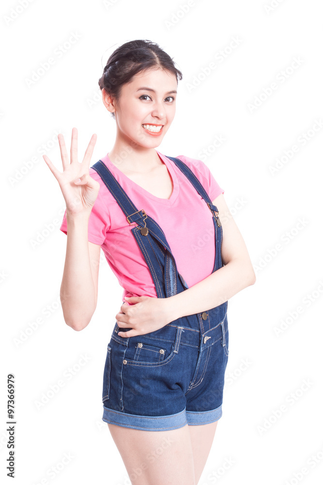 Young woman showing four fingers or victory gesture, isolated on white background Young woman showing four fingers or victory gesture, isolated on white background