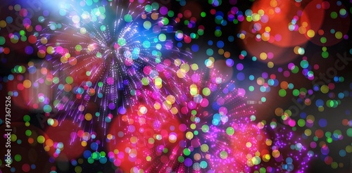 Colourful fireworks exploding on black background