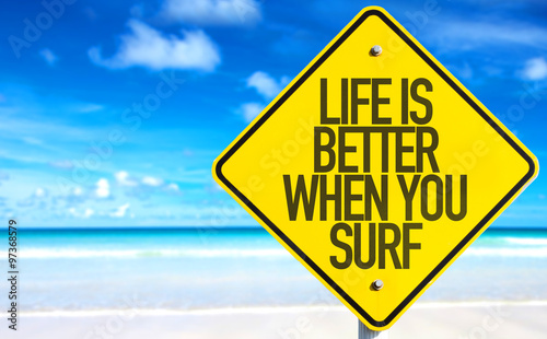 Life is Better When You Surf sign with beach background