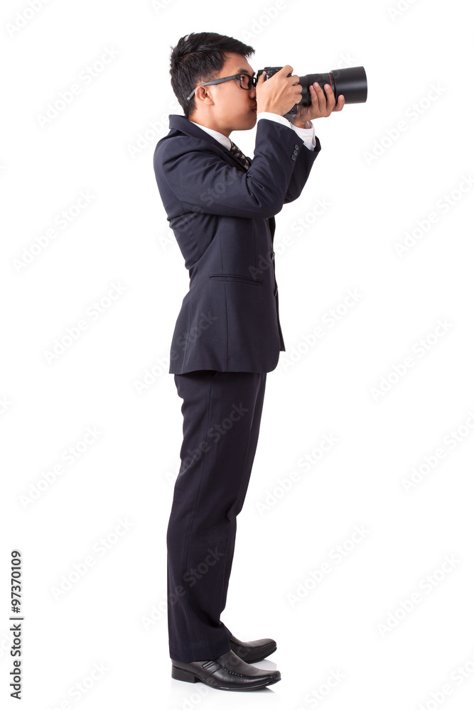 Businessman taking a photo on white background Businessman taking a photo on white background
