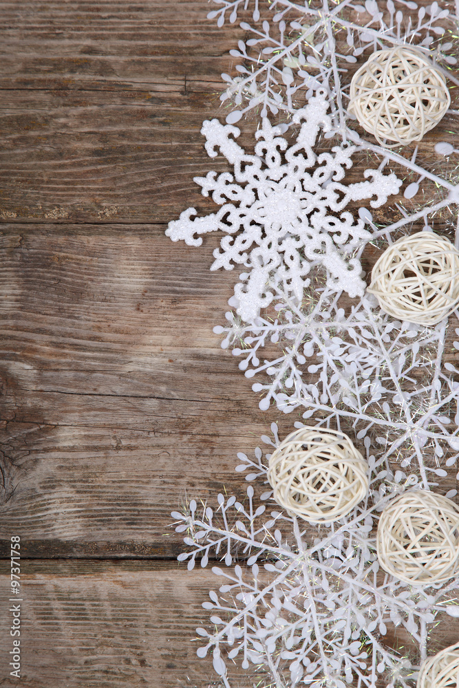 Fototapeta premium Christmas decorations on an old wooden table