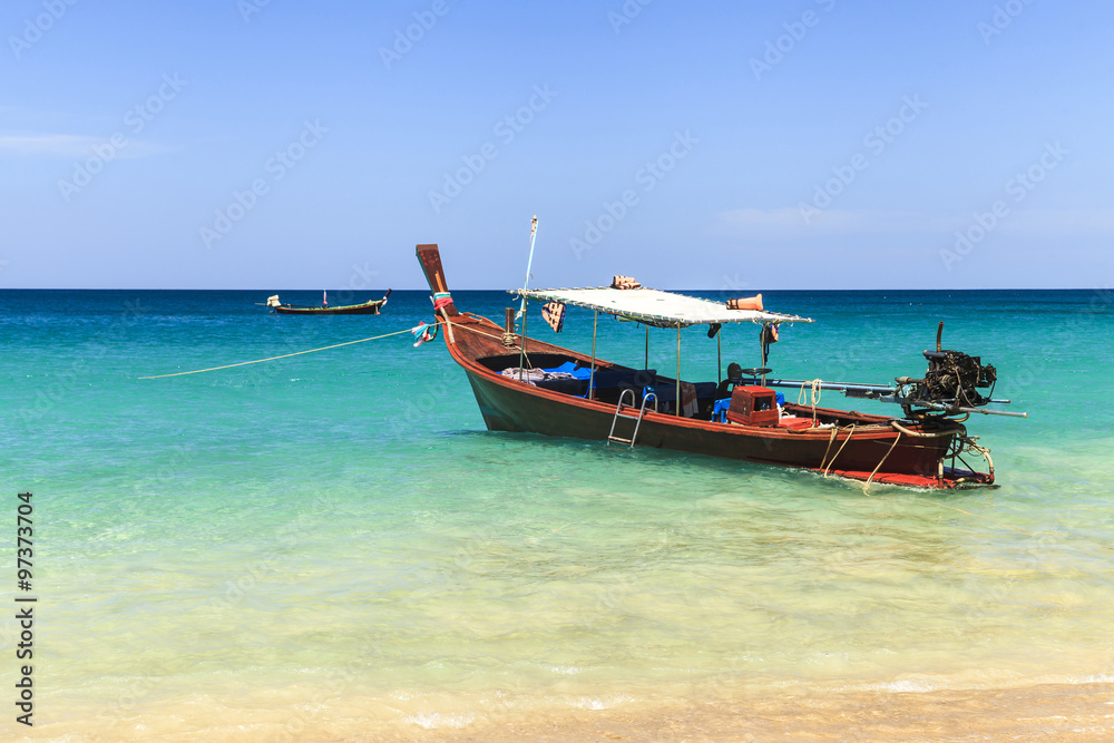 Traditional thai longtail boat at famous sunny Long Beach