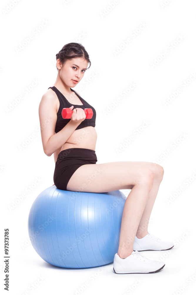Fitness woman sport training with exercise ball and lifting weights Fitness woman sport training with exercise ball and lifting weights