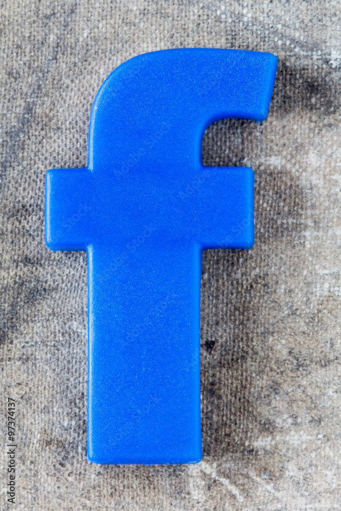 Blue plastic letter F