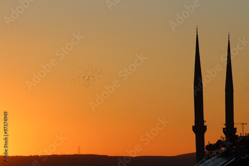 sunset mountains and mosque