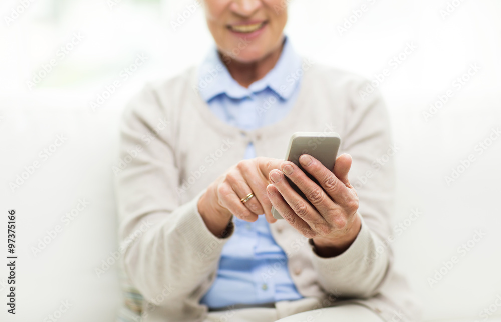 close up of senior woman with smartphone texting close up of senior woman with smartphone texting