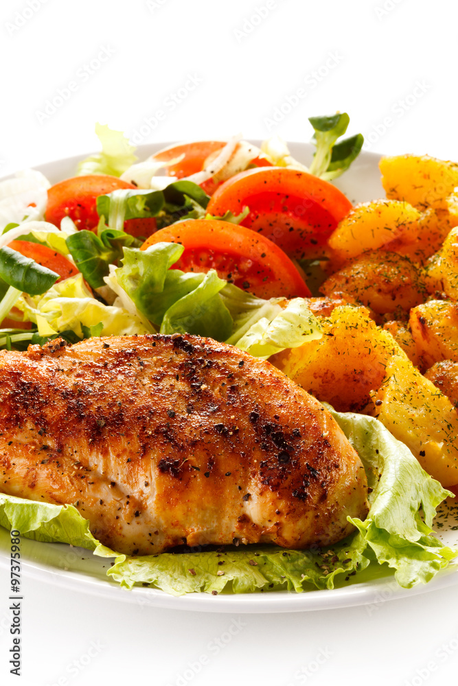 Fried chicken fillet, chips and vegetable salad Fried chicken fillet, chips and vegetable salad