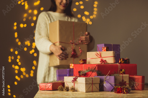 Female holding christmas gift box