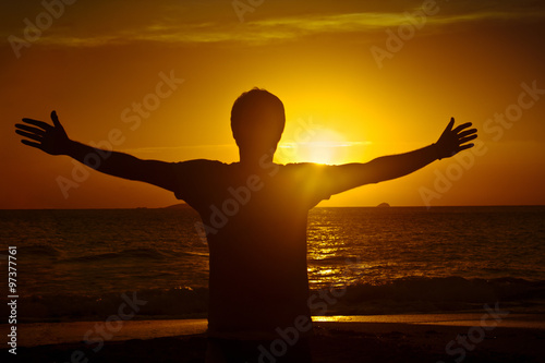 Man enjoying the sunset in Ibiza, Balearic Islands © joansorde