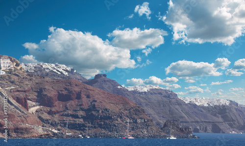Santorini - The cliffs of calera with the cruises withe the Imerovigli and Skaros photo