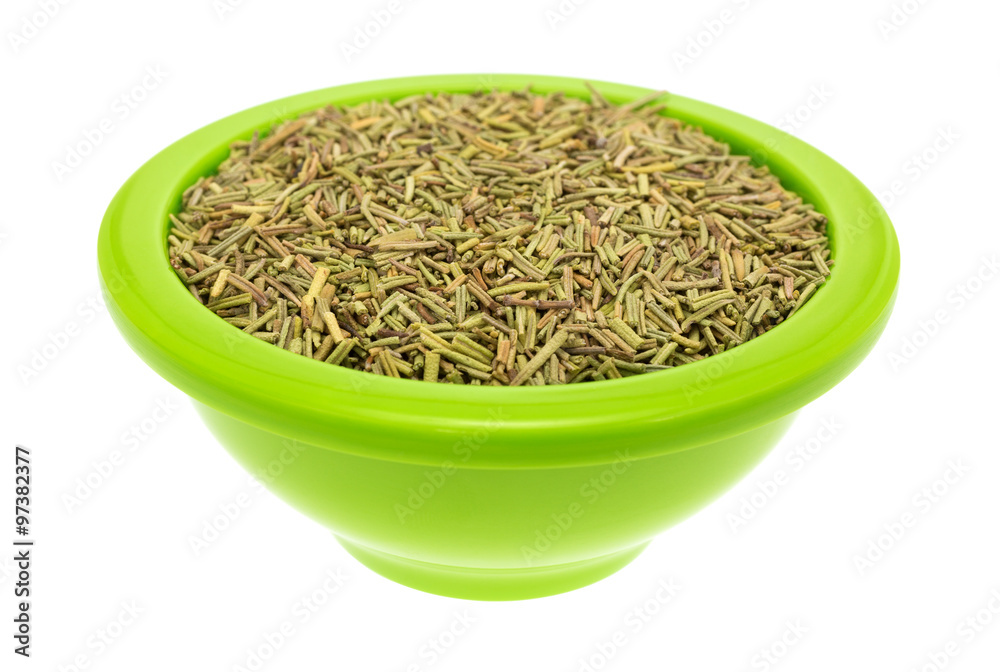 Bowl of rosemary leaves on a white background