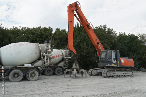 excavator, concrete mixer