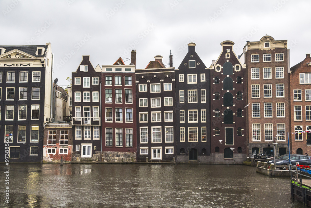 Typical houses on river in Amsterdam