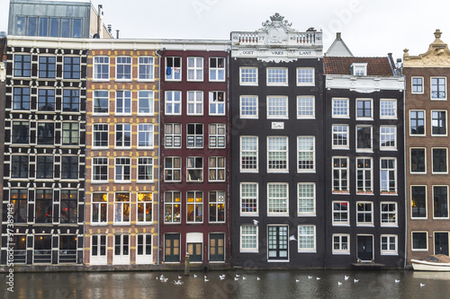 Typical houses on river in Amsterdam