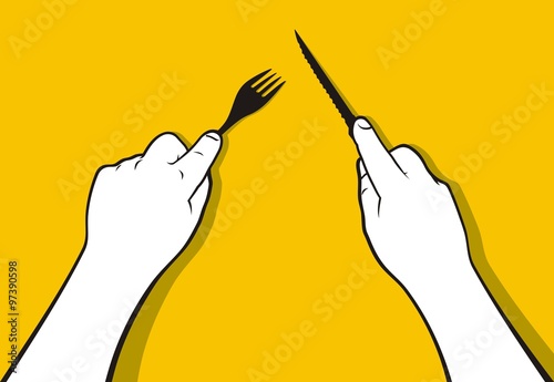 Hands holding fork and knife eating