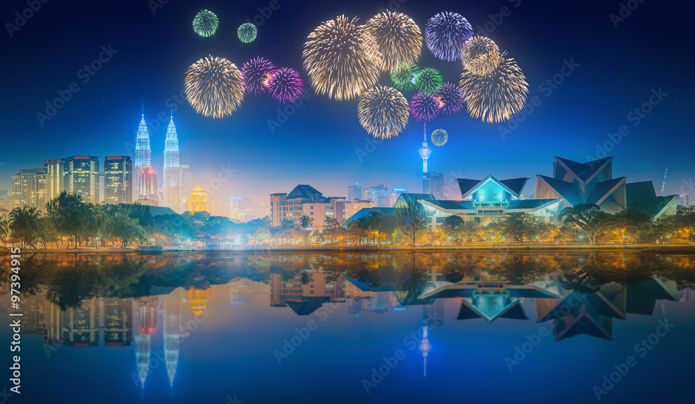 Fototapeta premium Beautiful fireworks above cityscape of Kuala Lumpur skyline