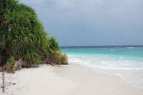 Empty white sand beach Maldives