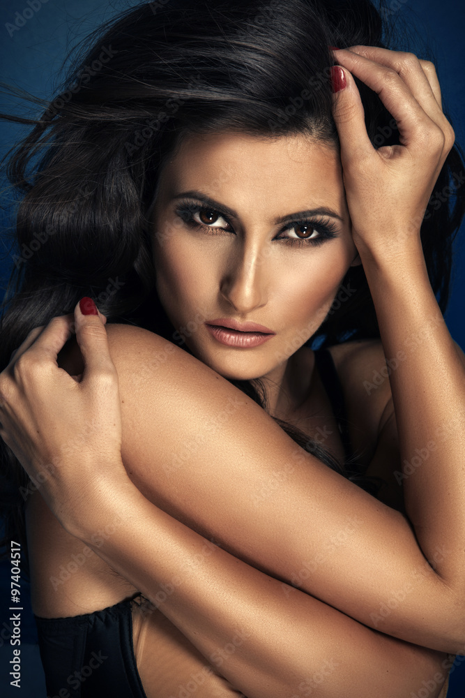 Portrait of sexy attractive brunette woman posing in fashionable lingerie in studio Portrait of sexy attractive brunette woman posing in fashionable lingerie in studio