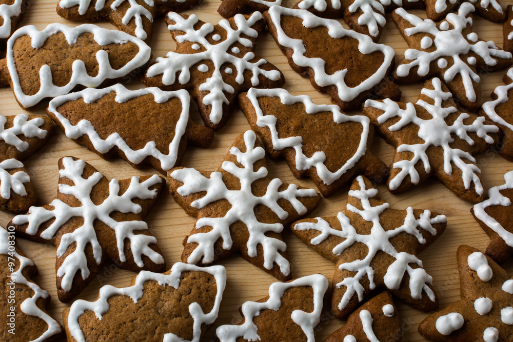Christmas gingerbread on a light wooden background, clouse up