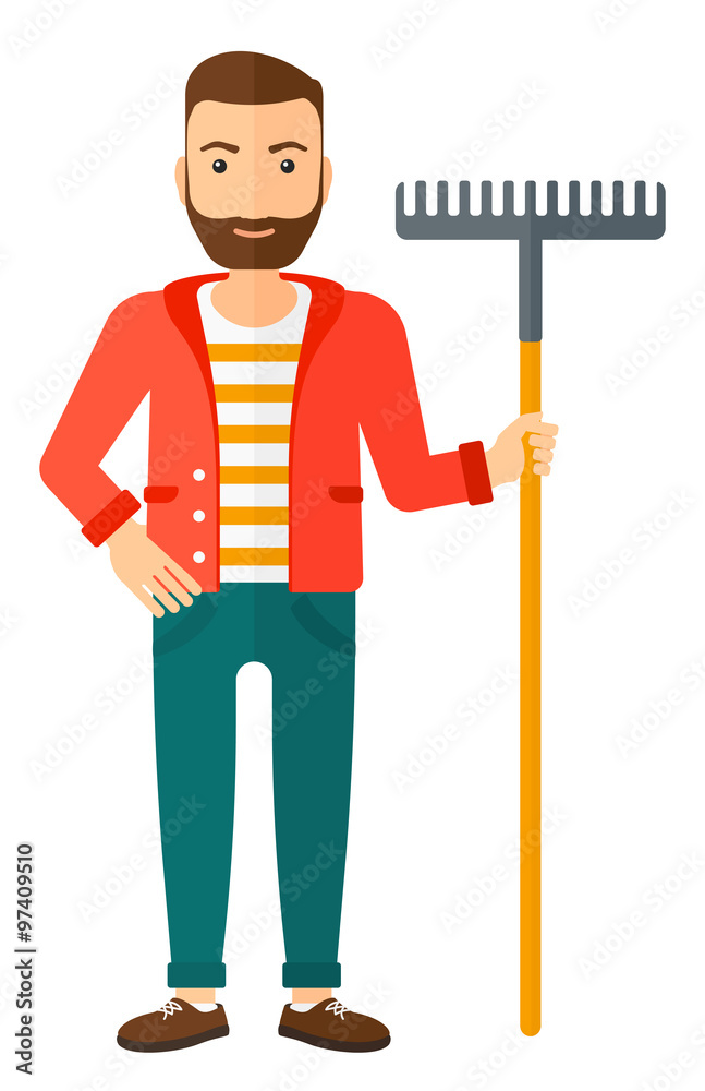 Man standing with rake. Man standing with rake.