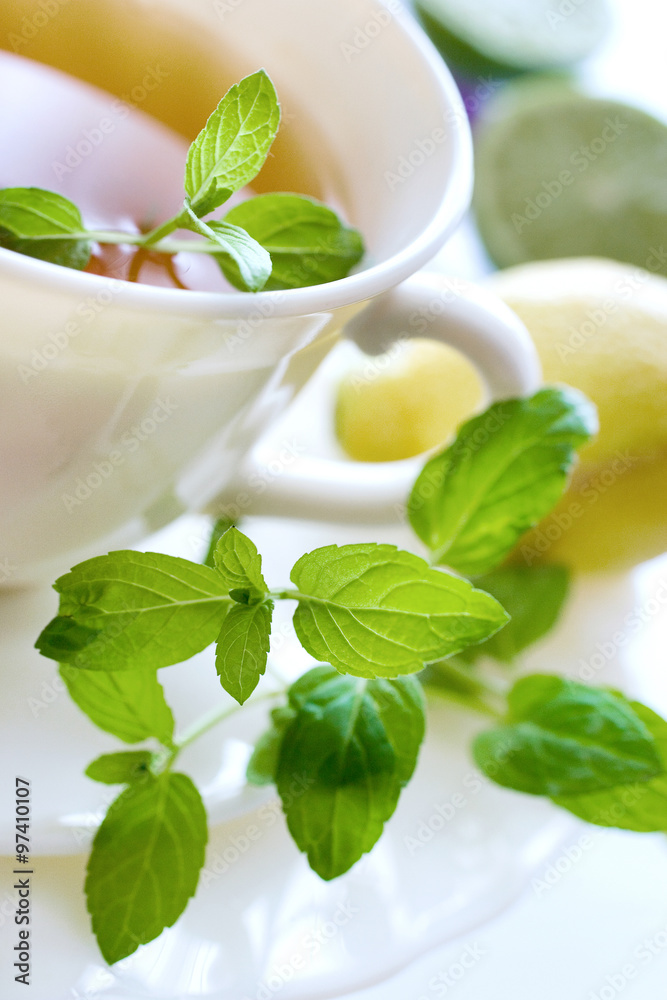 black tea with a fresh lemon and mint black tea with a fresh lemon and mint