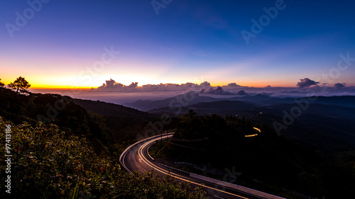 Doi Inthanon National park in the sunrise, mist and main road at