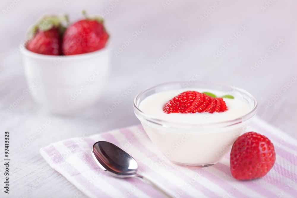 yogurt and strawberries on romantic background yogurt and strawberries on romantic background