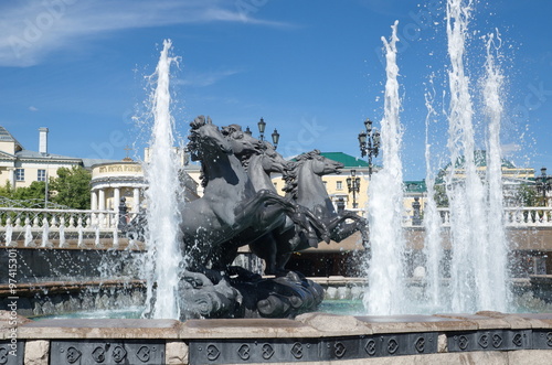 Moscow, Russia - June 18. Horse Sculptures and the fountain "Geyser" on Manezhnaya square