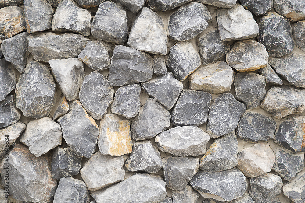 Pattern gray color of modern style design stacked stone wall background, real stone wall surface with cement Pattern gray color of modern style design stacked stone wall background, real stone wall surface with cement