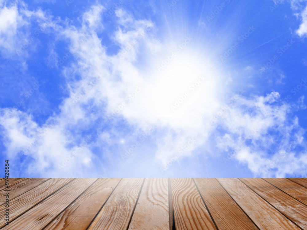 Wooden top board empty table in front of sky background. Perspective wood over nature view  for display or montage your products..