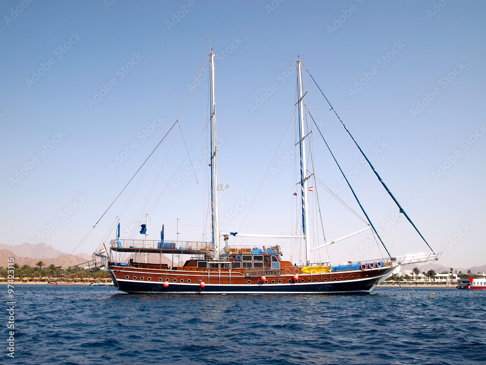 Sailboat against Egyptian shoe