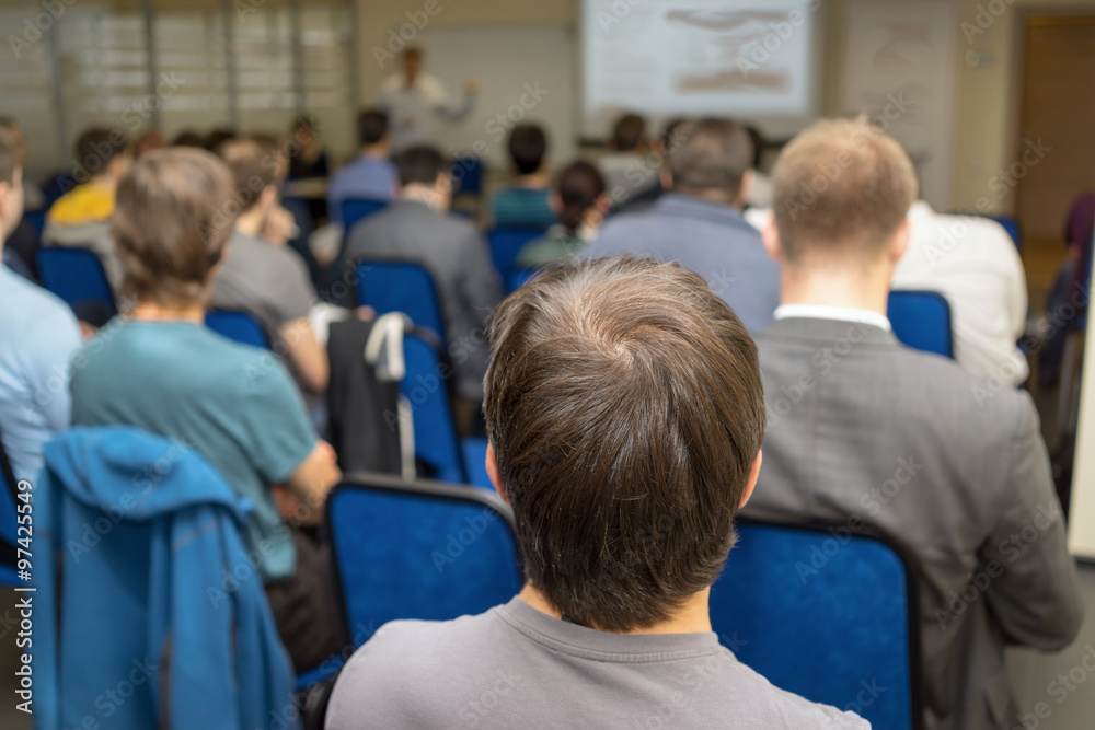 Back view of audience ina business conference Back view of audience ina business conference