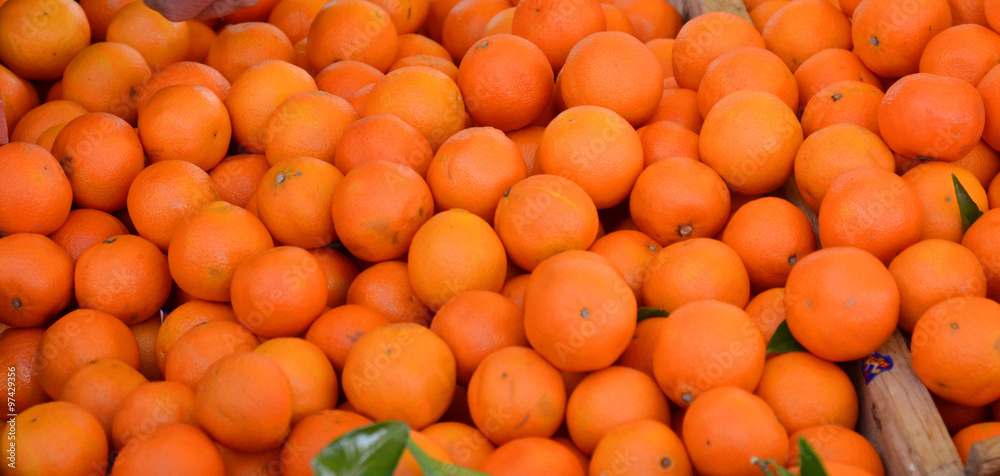 Ripe tangerines  for sale on a  farmer`s market