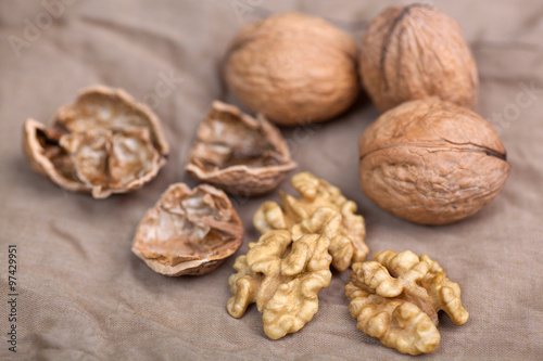 Walnut without shell close-up, and nuts in the shell