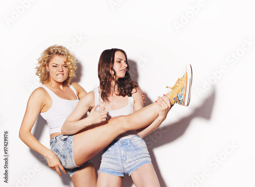 Two best girlfriends  having fun photo