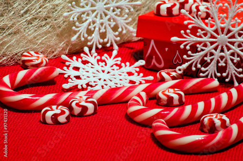 Christmas composition with red and white caramel