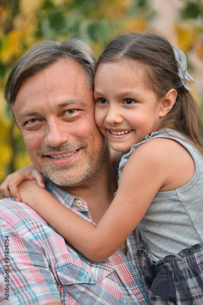 Fototapeta premium father with daughter in summer park