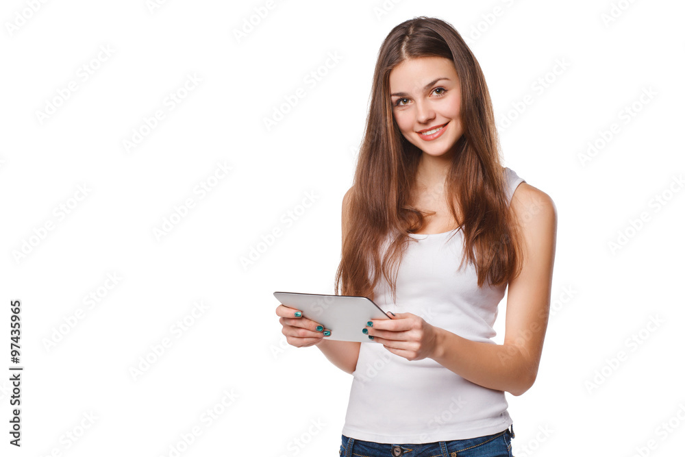 Attractive smiling girl in white shirt using tablet. Woman with tablet pc, isolated on white background Attractive smiling girl in white shirt using tablet. Woman with tablet pc, isolated on white background