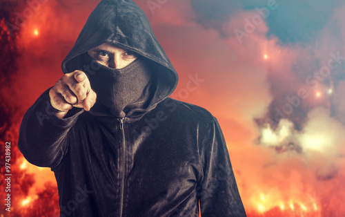 Angry hooligan pointing at you