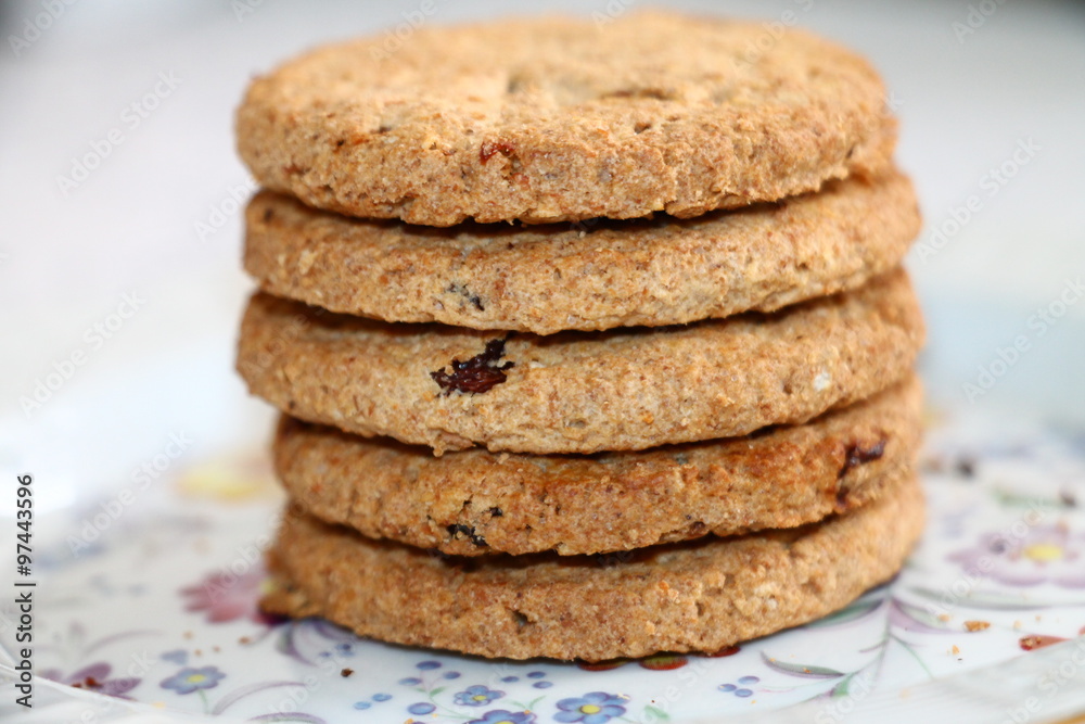 Fresh oatmeal cookies with seeds of cereals and raisins Fresh oatmeal cookies with seeds of cereals and raisins