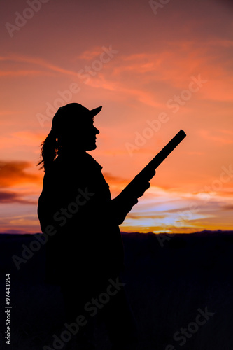 Hunter Silhouetted at Sunset