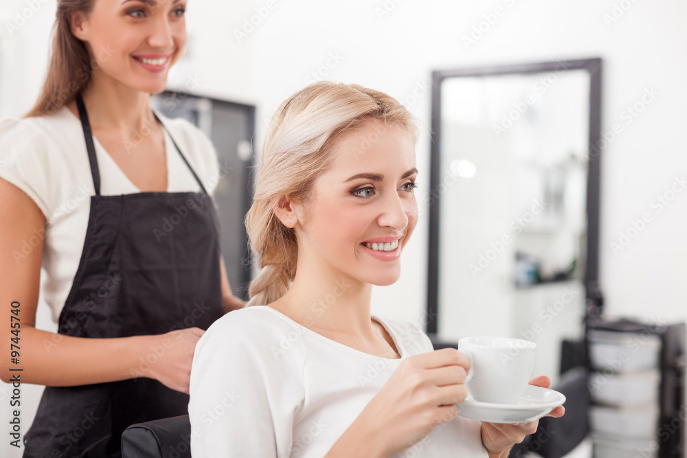 Beautiful blond girl is attending hairdressing saloon Beautiful blond girl is attending hairdressing saloon