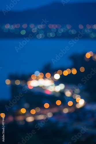 Traffic lights of the night city road