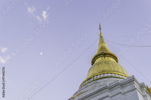 Thai Golden Pagodawit blue sky photo