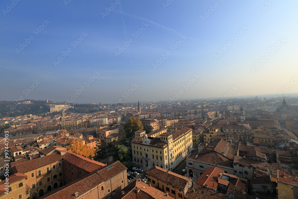 Fototapeta premium Roofs of houses and towers of the Italian Verona from the observation deck