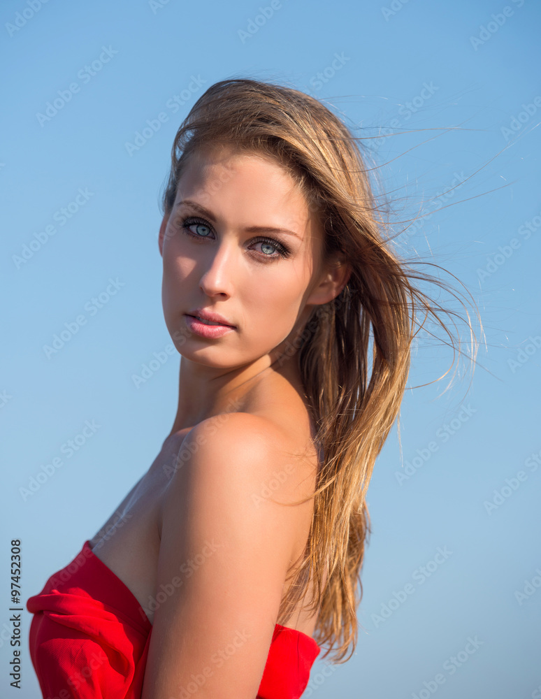Beautiful young woman in red fabric Beautiful young woman in red fabric