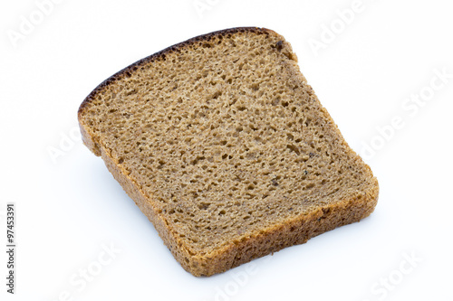 Dark rue bread on a white background.