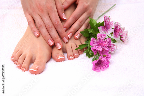 Fototapeta Naklejka Na Ścianę i Meble -  Closeup photo of a beautiful female feet with pedicure