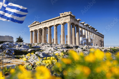 Parthenon temple with spring flowers on the Acropolis in Athens, Greece