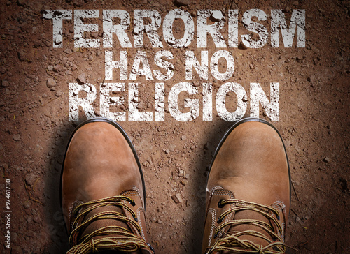 Canvas Print Close up of boots with text of terrorism has no religion
